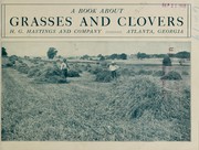 Cover of: A book about grasses and clovers