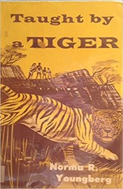 Taught by a tiger by Norma R. Youngberg