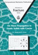 On wave propagation in elastic solids with cracks