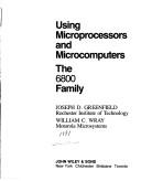 Using microprocessors and microcomputers by Joseph D. Greenfield