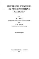 Electronic processes in non-crystalline materials