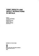 Point defects and defect interactions in metals