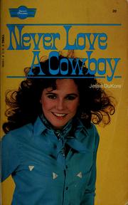 Cover of: Never love a cowboy by Jesse DuKore