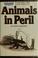 Cover of: Animals in peril