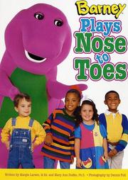 Barney plays nose to toes by Margie Larsen