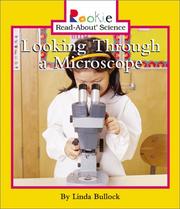 Cover of: Looking Through a Microscope (Rookie Read-About Science) by 