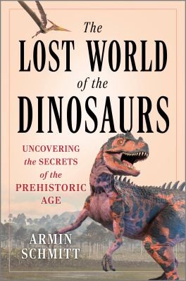 Book cover for The Lost World of the Dinosaurs by Armin Schmidt, a picture of a large toothed orange and black carnosaur against a distant forest background, a pink cloudy sky above.