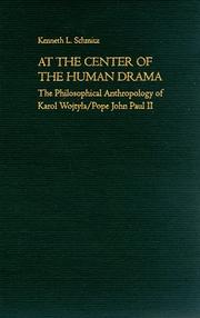 At the center of the human drama by Kenneth L. Schmitz