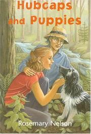 Hubcaps and Puppies by Rosemary Nelson
