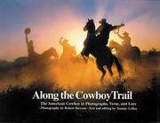 Cover of: Along the cowboy trail: the American cowboy in photographs, verse and lore