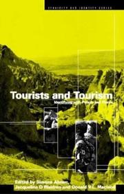 Cover of: Tourists and tourism: identifying with people and places