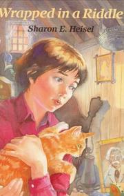 Front cover of Wrapped in a riddle by Sharon E. Heisel