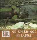 Indian rhinos and their babies by Marianne Johnston