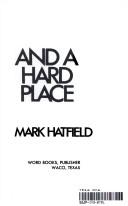 Between a rock and a hard place by Mark O. Hatfield