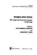 Cover of: Women into wives: the legal and economic impact of marriage