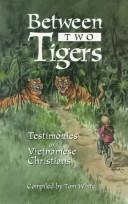 Cover of: Between Two Tigers: Testimonies of Vietnamese Christians