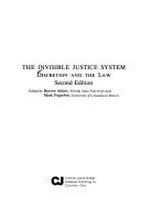 The Invisible justice system by Burton M. Atkins, Mark Pogrebin