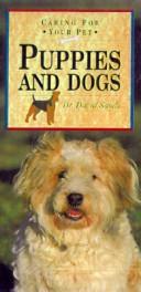 Cover of: Puppies and Dogs (Caring for Your Pet Series) by David Sands