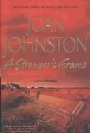 Cover of: A stranger's game by Joan Johnston