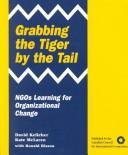 Cover of: Grabbing the tiger by the tail by David Kelleher
