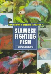 Siamese fighting fish by Gene Wolfsheimer