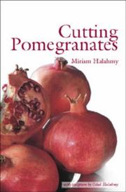 Cutting pomegranates by Miriam Halahmy