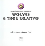 Cover of: Wolves & their relatives by Erik D. Stoops
