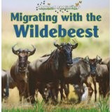 Cover of: Migrating with the wildebeest