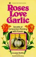 best books about Roses Roses Love Garlic: Companion Planting and Other Secrets of Flowers